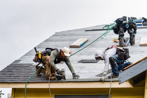 Professional Gutter Installation technician working in Chelsea, VT